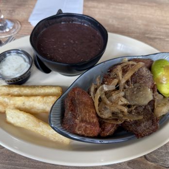 Copacabana Cuban Cuisine - Masitas de Puerco Fritas with black beans and yucca. - Cuban Near Me - Jupiter, Florida