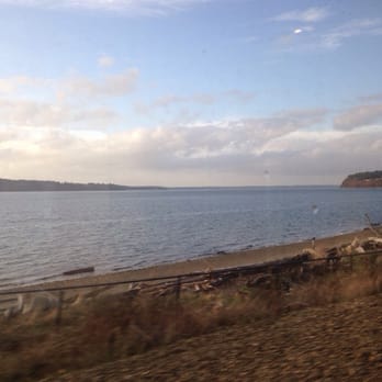 Amtrak - Looking out the window from the bistro - lower Puget Sound just south of Tacoma. - Train Stations Near Me - Portland, Oregon Amtrak - Looking out the window from the bistro - lower Puget Sound just south of Tacoma. - Train Stations Near Me - Portland, Oregon