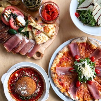 Osteria Gallo - a variety of food items on a table - Italian Near Me - Montreal, Quebec Osteria Gallo - a variety of food items on a table - Italian Near Me - Montreal, Quebec