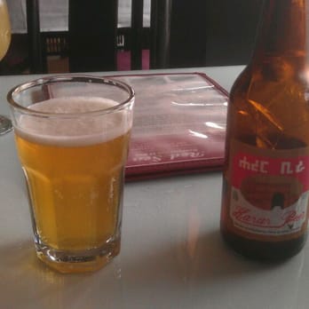Red Sea Ethiopian & Eritrean Cuisine Restaurant - Ethiopian beer and honey wine (background). - Ethiopian Near Me - Oakland, California Red Sea Ethiopian & Eritrean Cuisine Restaurant - Ethiopian beer and honey wine (background). - Ethiopian Near Me - Oakland, California