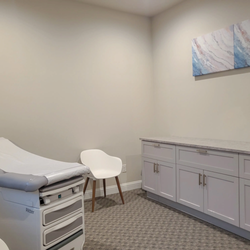Peoples Medical Care - Bright, comfortable exam room designed for conversation and care at Peoples Medical Care.