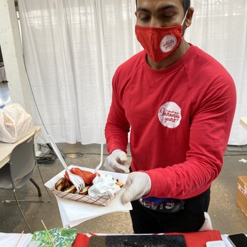 Mississauga Vegfest - a man in a red shirt holding a plate of food - Festivals Near Me - Mississauga, Ontario Mississauga Vegfest - a man in a red shirt holding a plate of food - Festivals Near Me - Mississauga, Ontario