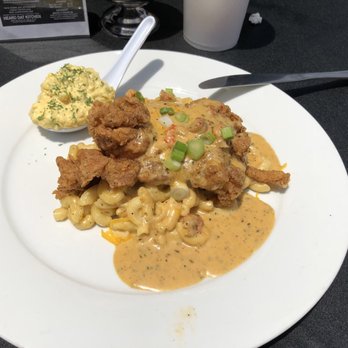 Heard Dat Kitchen - Bourbon Street Love- award winning fried chicken on top of some amazing Mac and Cheese, served in Crawdat Cream sauce! Yum!! - Cajun/Creole Near Me - New Orleans, Louisiana Heard Dat Kitchen - Bourbon Street Love- award winning fried chicken on top of some amazing Mac and Cheese, served in Crawdat Cream sauce! Yum!! - Cajun/Creole Near Me - New Orleans, Louisiana