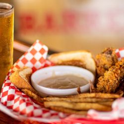 Red Barrel Bar and Grill - Steak finger and chicken strip baskets come with Texas Toast, hand-cut fries, and gravy.