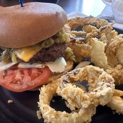 Tiny's Burger Barn - Green Chile Cheddar Burger on a Brioche Bun