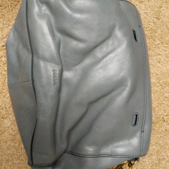 All in Moving Systems - Condition of a formerly flawless $220 handbag after they packed it with no packing at the bottom of a box of heavy things - Movers Near Me - San Jose, California All in Moving Systems - Condition of a formerly flawless $220 handbag after they packed it with no packing at the bottom of a box of heavy things - Movers Near Me - San Jose, California