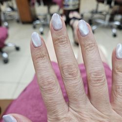Trina Beauty - It's not the pink cateye I wanted, but white is fine. The cateye silver top coat, drowned out the whitish/pink base coat I chose.