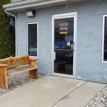 Auto Tech Collision Center - Outside waiting bench - Body Shops Near Me - White Lake, Michigan