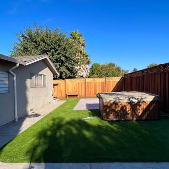Vineyard Landscape and Maintenance - a backyard with a hot tub - Landscaping Near Me Vineyard Landscape and Maintenance - a backyard with a hot tub - Landscaping Near Me