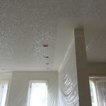 Skytex Texturing - a room with a ceiling covered in plastic - General Contractors Near Me Skytex Texturing - a room with a ceiling covered in plastic - General Contractors Near Me