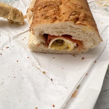 Subway - a half eaten sandwich on a piece of paper - Sandwiches Near Me - Litchfield Park, Arizona Subway - a half eaten sandwich on a piece of paper - Sandwiches Near Me - Litchfield Park, Arizona