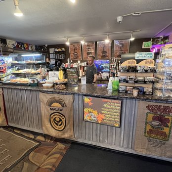 Higher Grounds Cafe - a man standing at the counter - Coffee & Tea Near Me - Golden, Colorado