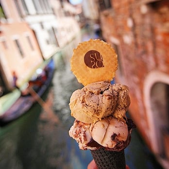 Suso - Opera and Suso Flavors on a black cone - Desserts Near Me - Venezia, VE Suso - Opera and Suso Flavors on a black cone - Desserts Near Me - Venezia, VE
