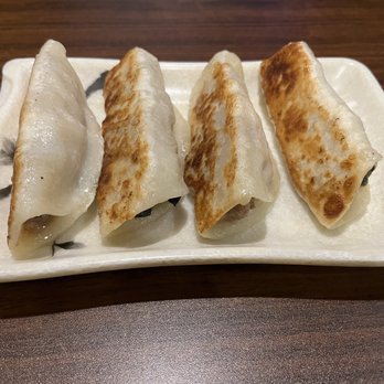Julie's Noodles - 7. Pan Fried Pork and Shrimp Dumplings - Noodles Near Me - Austin, Texas Julie's Noodles - 7. Pan Fried Pork and Shrimp Dumplings - Noodles Near Me - Austin, Texas