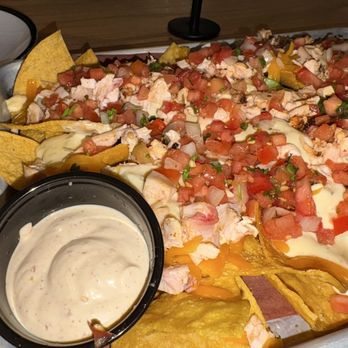 Jim 'N Nick's Bar-B-Q - Smoked chicken nachos (creama ots) - Barbeque Near Me - Savannah, Georgia Jim 'N Nick's Bar-B-Q - Smoked chicken nachos (creama ots) - Barbeque Near Me - Savannah, Georgia
