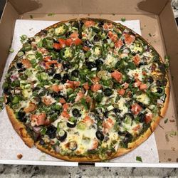 Bombay Curry Pizza - Bombay Shahi, medium. Thick with toppings.