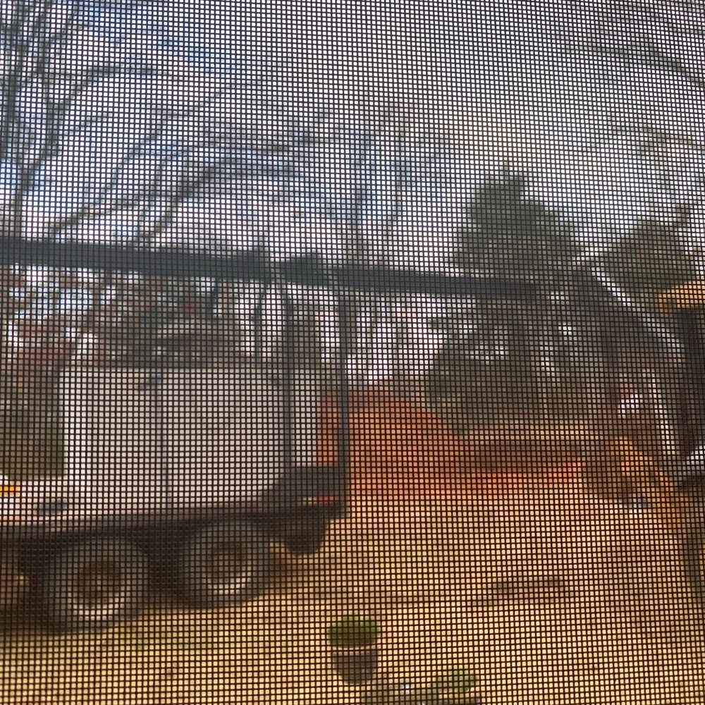 F5 Storm shelters - a view of a truck through a screen - General Contractors Near Me - Edmond, Oklahoma