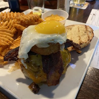 Grumpy Jack's - Double Trouble Burger topped with a Fried Egg. - Sports Bars Near Me - Port Jefferson, New York
