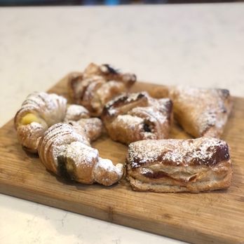 Dolce Italy - a variety of pastries on a cutting board - Bakeries Near Me - Greenville, South Carolina
