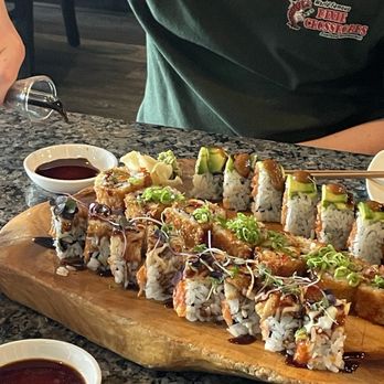 Umi - (front to back) bishojo roll, mr krabs roll, and godzilla roll - Japanese Near Me - Winter Park, Florida Umi - (front to back) bishojo roll, mr krabs roll, and godzilla roll - Japanese Near Me - Winter Park, Florida