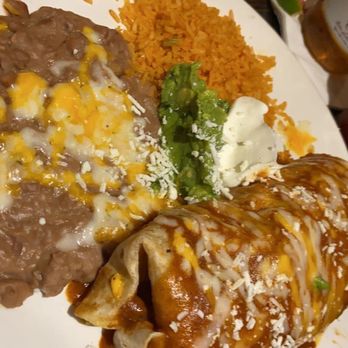Miguel's Cocina - Surf and Turf burrito with beans and rice!!!! Comes with shrimp and carne asada. - Mexican Near Me - Coronado, California