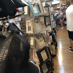 God's World - The overly crowded display cases and cramped aisles.
