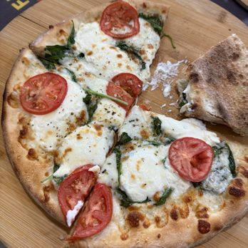 Britt's Coal Fire Pizza - White Pizza - Pizza Near Me - Treasure Island, Florida Britt's Coal Fire Pizza - White Pizza - Pizza Near Me - Treasure Island, Florida