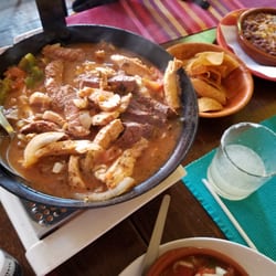 Burrito Amsterdam - Tender chicken and steak fajitas!