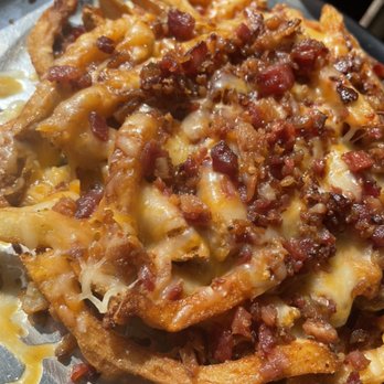 Jed’s - a plate of french fries topped with cheese and bacon - Barbeque Near Me - Madison Heights, Virginia Jed’s - a plate of french fries topped with cheese and bacon - Barbeque Near Me - Madison Heights, Virginia