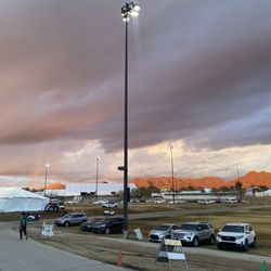 Field with valet cars parked for WMO