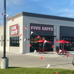 Five Guys - Exterior photograph of the Five Guys restaurant at 625 West Highway 30 in Gonzales, Louisiana.