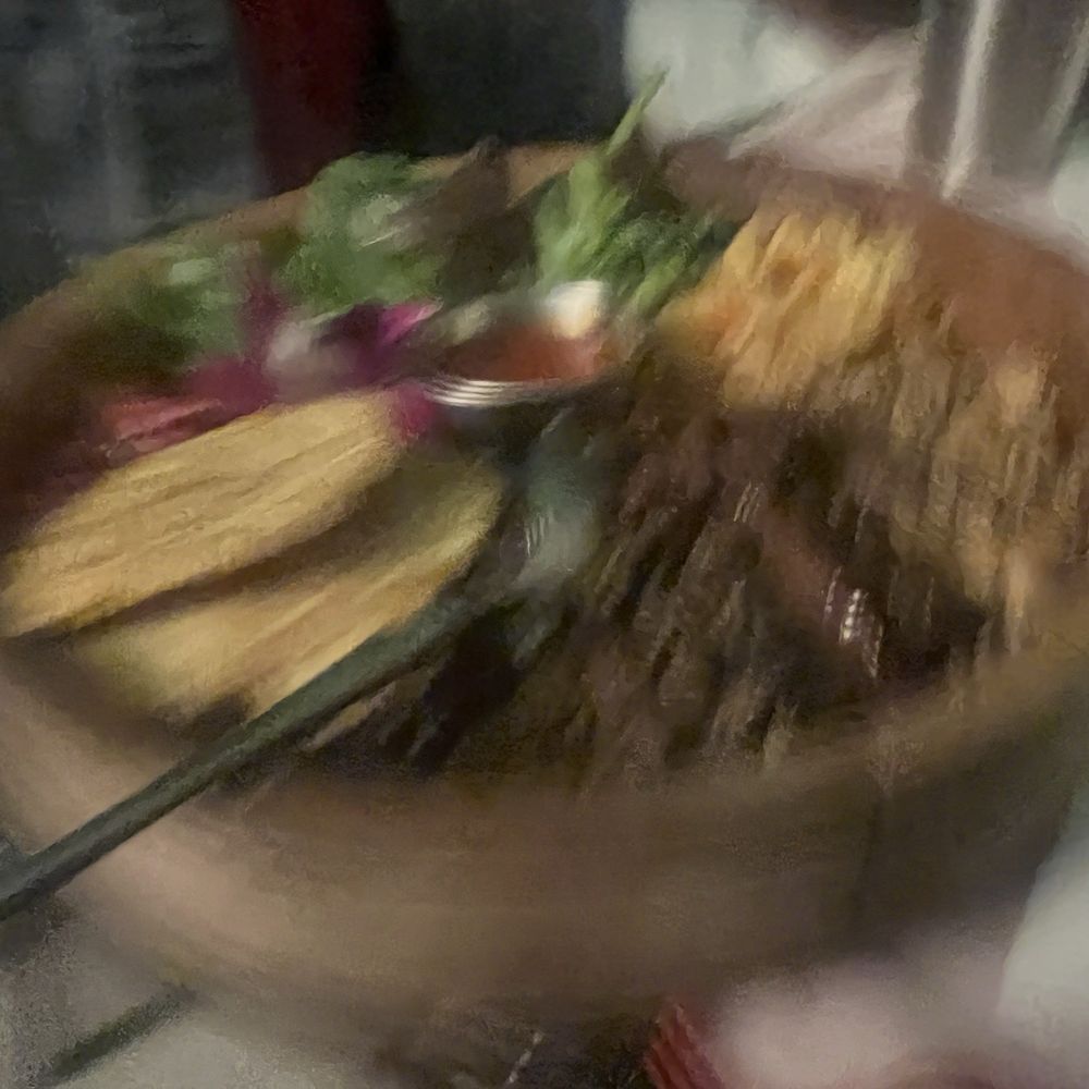 Shareable bowl featuring Diri Djon djon (blurry and delish)