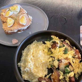 Henley - Scramble with grits, cat fish toast - New American Near Me - Nashville, Tennessee Henley - Scramble with grits, cat fish toast - New American Near Me - Nashville, Tennessee