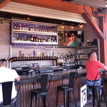 Bushfire Kitchen - Menifee - Bar area and outdoor dining - Gluten-Free Near Me - Menifee, California Bushfire Kitchen - Menifee - Bar area and outdoor dining - Gluten-Free Near Me - Menifee, California