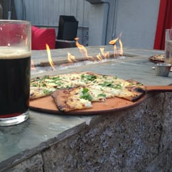 isa.bella Pizza, Pasta, Craft Beer - Spinach & ricotta pizza, Bass Stout and a fire. Perfect.