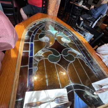 The Quarterdeck Restaurant - Stained glass window tabletops. - Seafood Near Me - Falmouth, Massachusetts