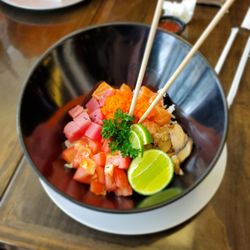 Poke' Bowl I love You - Salmon and tuna bowl with white rice and a few veggies.