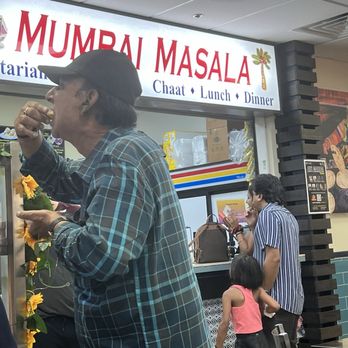 Mumbai Masala - Store front, customer enjoying Pani Puri - Indian Near Me - Norcross, Georgia Mumbai Masala - Store front, customer enjoying Pani Puri - Indian Near Me - Norcross, Georgia