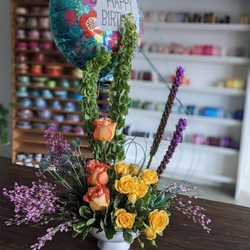 Owens Flower Shop - They never disappoint! I gave artist freedom with some minor suggestions. Awesome to work with!