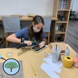 Five Oaks Academy A Montessori School - FOA Middle School students work on on construction and craft projects.