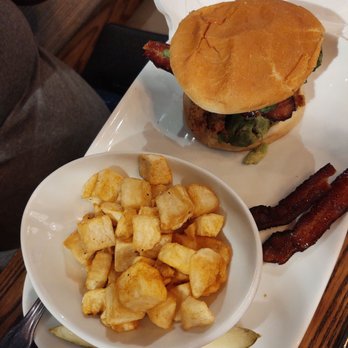 Another Broken Egg Cafe - Fried Southern chicken sandwich with potatoes. - Breakfast & Brunch Near Me - Bossier City, Louisiana Another Broken Egg Cafe - Fried Southern chicken sandwich with potatoes. - Breakfast & Brunch Near Me - Bossier City, Louisiana