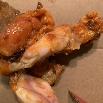 Rosati's Pizza - a half eaten chicken wing - Pizza Near Me - Round Lake Beach, Illinois