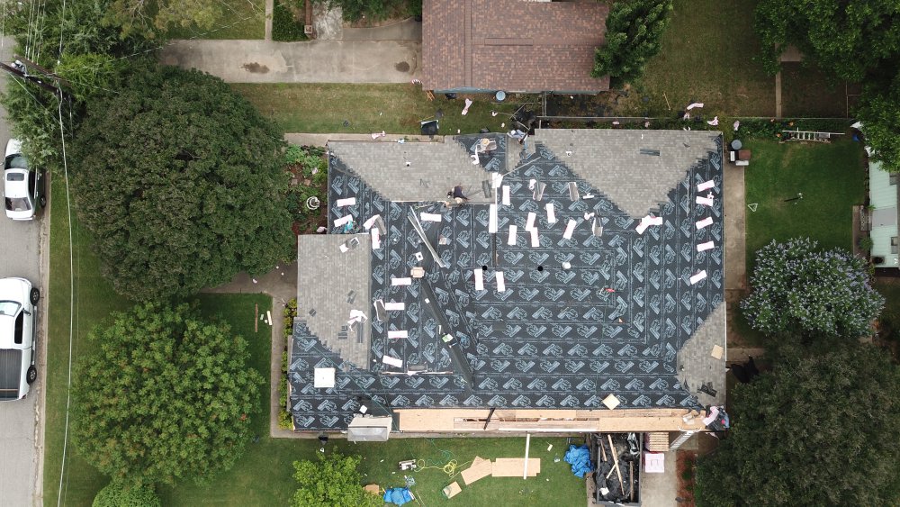 Slide of Triton Roofing & Restoration