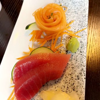Sakura - a plate of sushi and vegetables on a table - Sushi Bars Near Me - Ogden, Utah