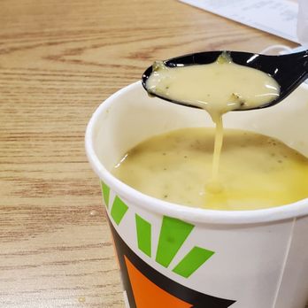 Saladworks - a bowl of soup with a spoon in it - Salad Near Me - Salisbury, Maryland