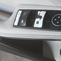 You can see where the buttons are SUPPOSED to be black but 2/3 of the covering was sucked off!