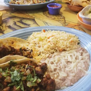 Mariscos Altamar - Yummy Pastor tacos and best refried beans ever. Supreme Nachos in the background. - Mexican Near Me - Albuquerque, New Mexico