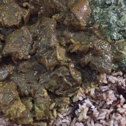 Island Pride Food Market - Curry goat, creamed spinach, rice and peas (beans)