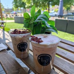 Iced rose lattes on a sunny day on Kenz Coffee's patio