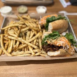 Nguyen's Kitchen - Grilled Pork Sandwich was awesome, juicy and flavorful Cajun Garlic Fries  was so so